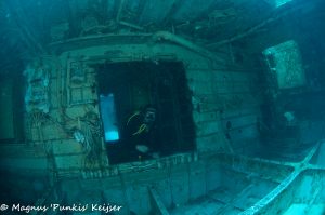 diver inside wreck malta